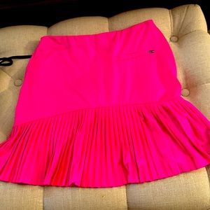 Raspberry colored flared golf skirt. Only worn once so practically brand new.